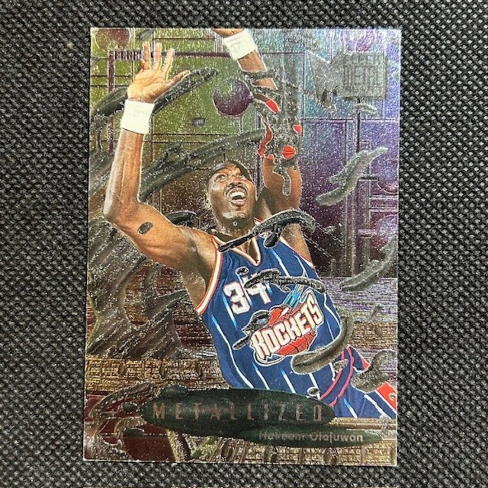 1996-97 Metal #227 Hakeem Olajuwon Metalized Houston Rockets HOF
